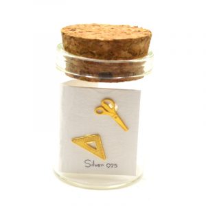 Σκουλαρίκι χάρακας και ψαλίδι